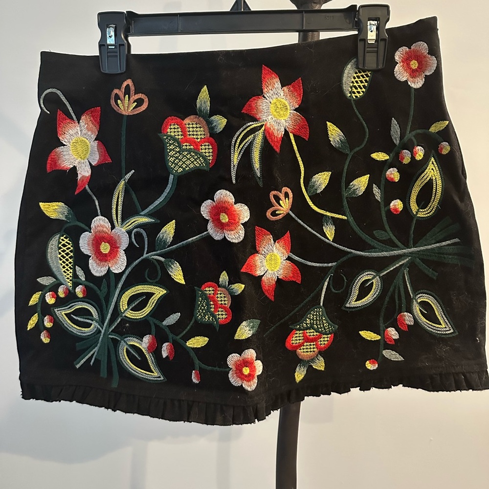 Black embroidered mini skirt